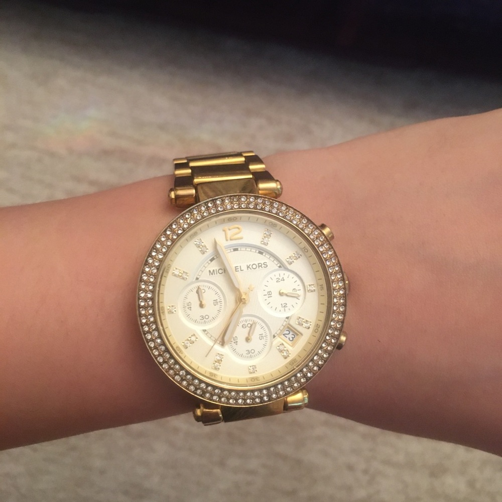 SOLD. Michael Kors stainless steel watch in gold